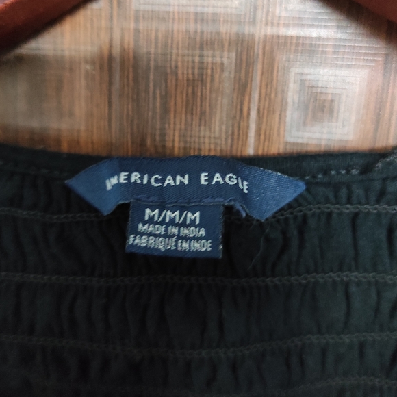 Black Smocked Top with Ruffels at the bottom - Picture 2 of 7